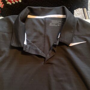 Nike Men's Black Polo Shirt with White Accents